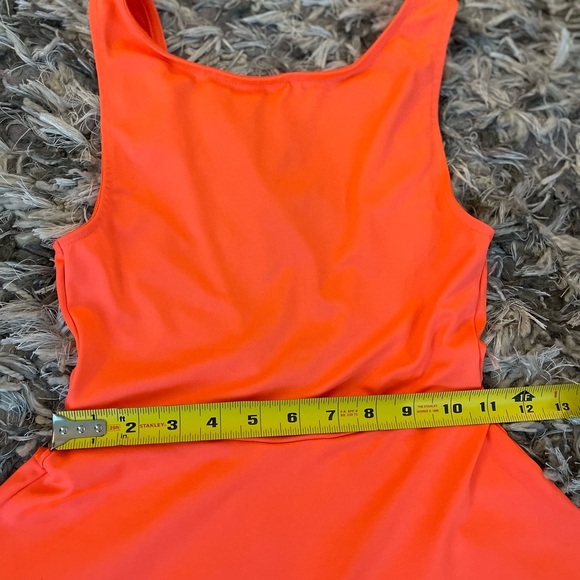 Bright orange mini dress with flared skirt and backless design - Picture 6 of 9